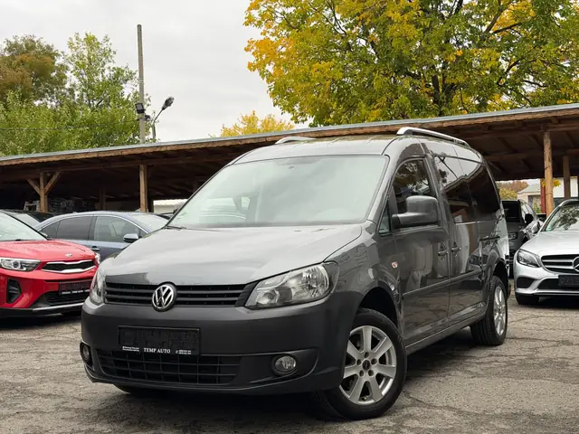VW Caddy, тъмно сив, 2011 г. – снимка от автокъщата